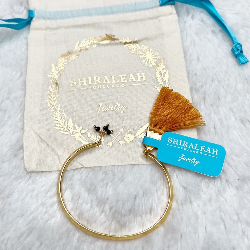 Shiraleah Anthropologie Saints Bangle Bracelet in Saffron
